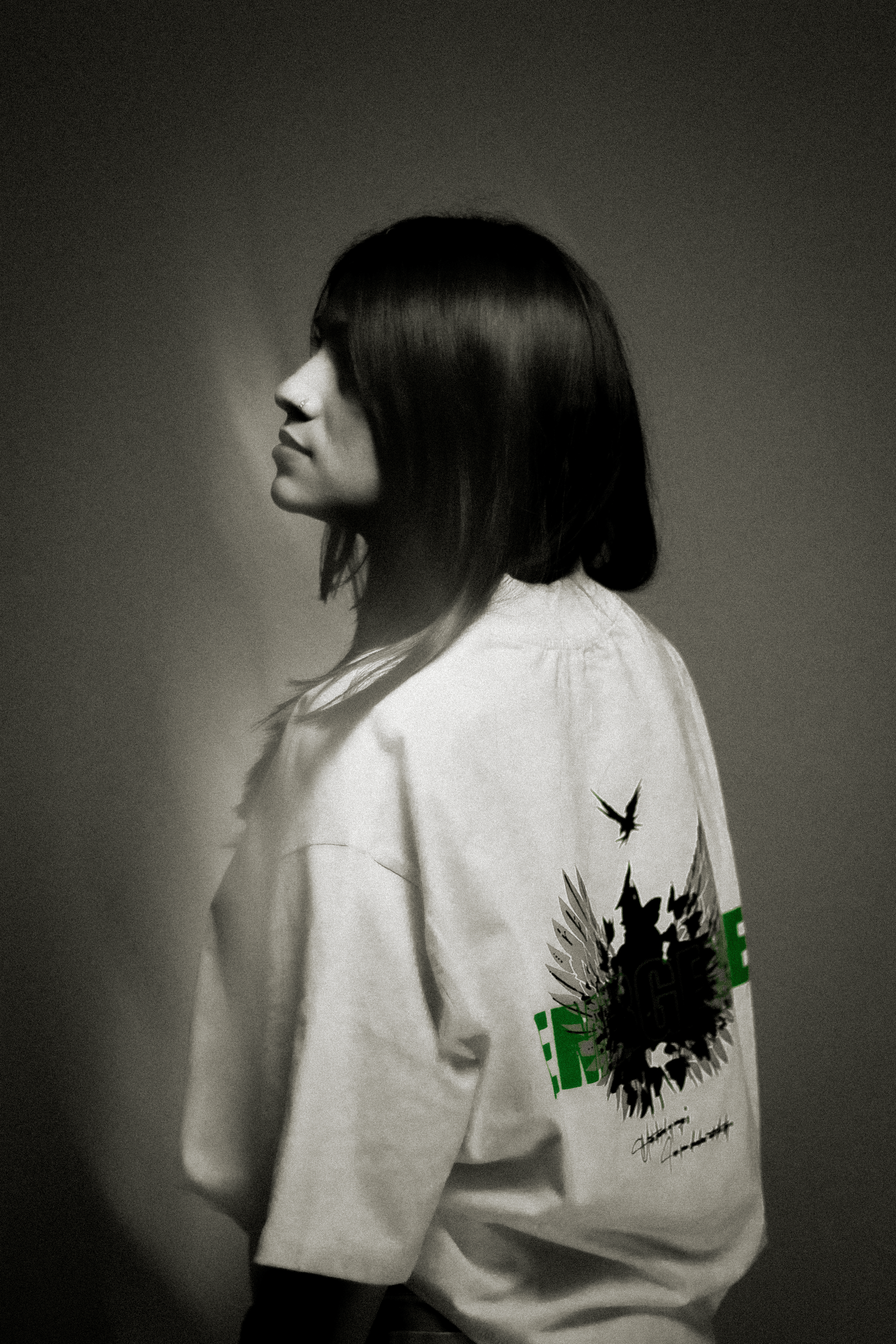 Model wearing white oversized limited edition Emergence t-shirt premium streetwear India