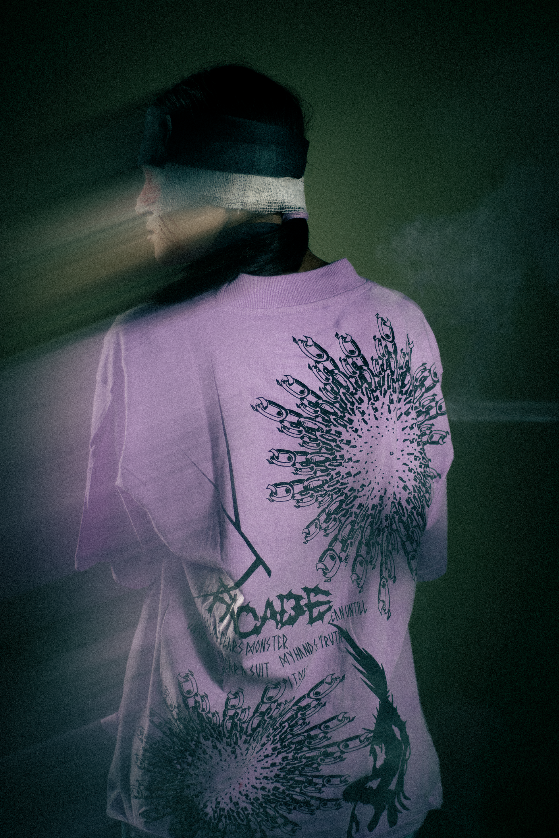 Model wearing lavender oversized Facade graphic t-shirt back design premium streetwear India